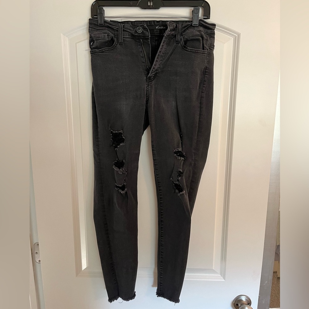 Women’s black jeans with rips